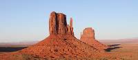 The Monument Valley buttes, on the Utah - Arizona border, lights up at sunset | Brad Atwal