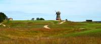 Cycling day on the South Fork, open fields and windmill