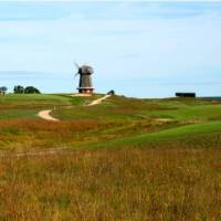 Cycling day on the South Fork, open fields and windmill