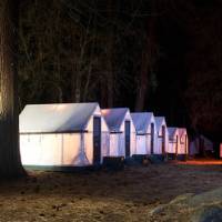 Tent cabin accommodation in Yosemite National Park at night | Curry House Yosemite National Park